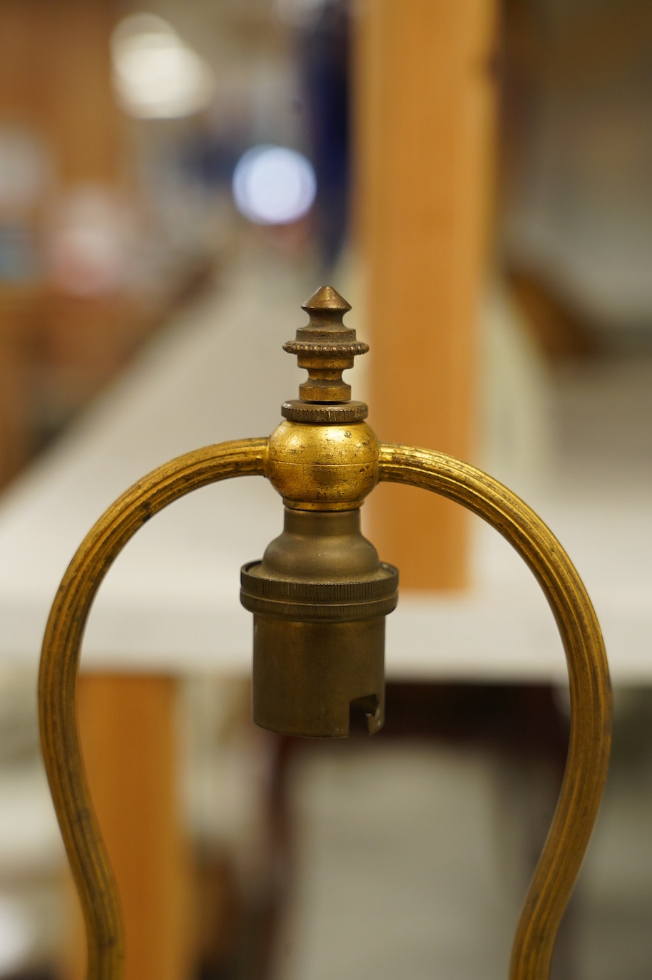 An Art Deco ormolu table lamp base, 59cm high. Condition - fair